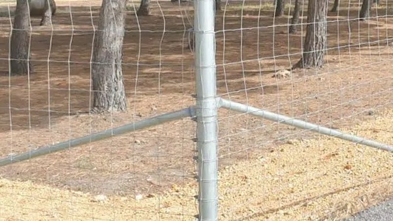 A StayTight exclusion fence end assembly installed in a paddock corner
