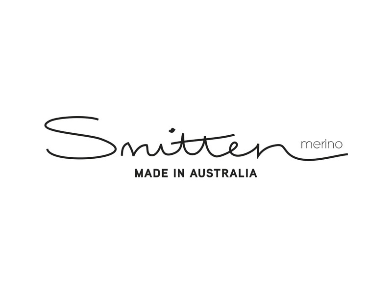 The Smitten Merino logo: Smitten in flowing script above the words Made in Australia